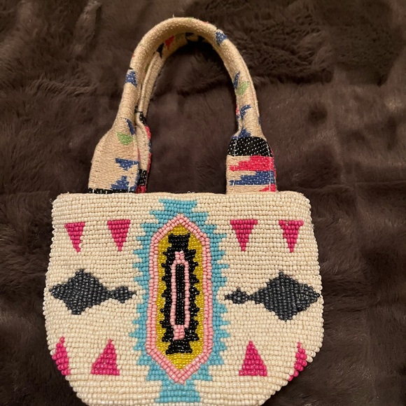 America & Beyond Beaded Artistic Handbag with white and multicolor patterns. - Picture 2 of 9